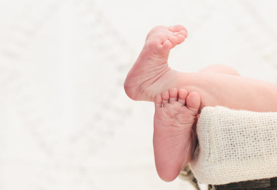 Baby feet and cloth